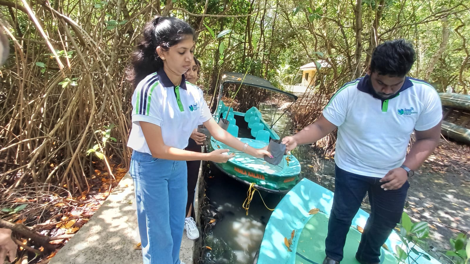 Following the awareness session, the group actively took part in a mangrove planting initiative