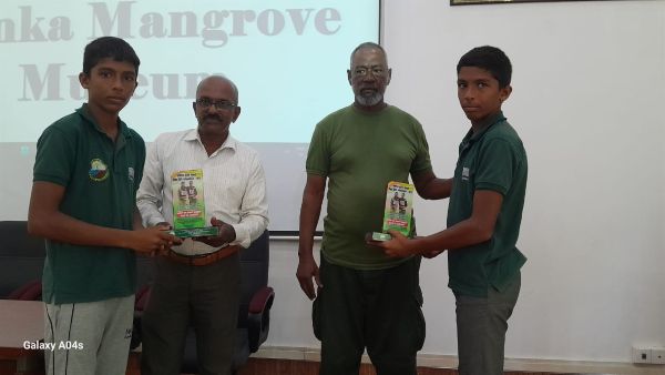 A special event was held at the Lanka Mangrove Museum to honor Nethsara and Pehesara, two members of the “Together With Mangroves” Children and Youth Environmental Society, for their outstanding achievement in sports. The duo proudly secured 5th place in the 100x4 relay event at the All Island School Games. In recognition of their accomplishment, they were presented with plaques by the museum staff.